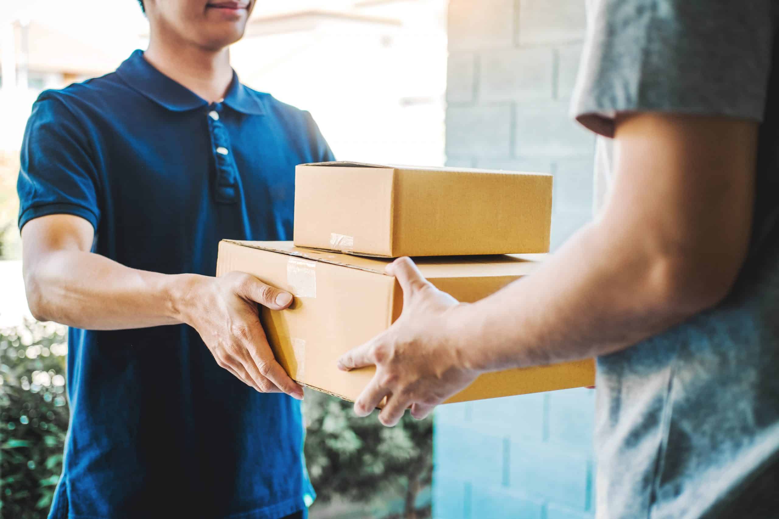 Deliverymen delivering goods to clients